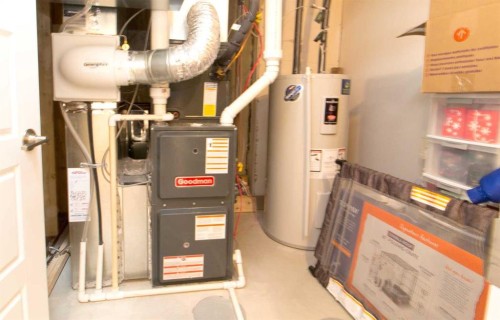 103 Sunrise Common, Cochrane, AB - Indoor Photo Showing Basement