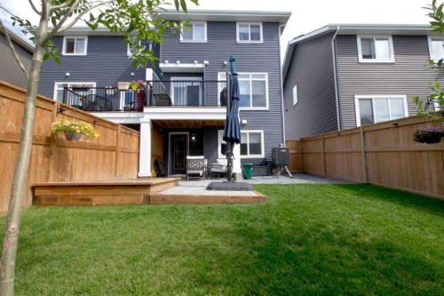 103 Sunrise Common, Cochrane, AB - Outdoor With Deck Patio Veranda With Exterior