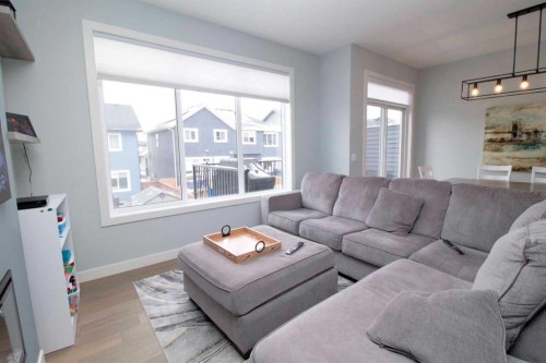 103 Sunrise Common, Cochrane, AB - Indoor Photo Showing Living Room