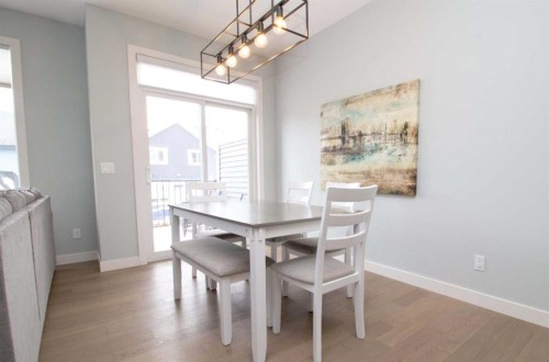 103 Sunrise Common, Cochrane, AB - Indoor Photo Showing Dining Room