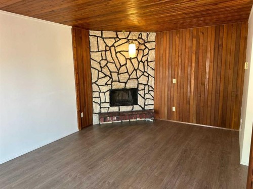 12 Huntley Close Ne, Calgary, AB - Indoor With Fireplace