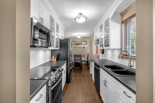 2211 45 Street Se, Calgary, AB - Indoor Photo Showing Kitchen With Double Sink