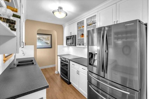 2211 45 Street Se, Calgary, AB - Indoor Photo Showing Kitchen With Double Sink With Upgraded Kitchen