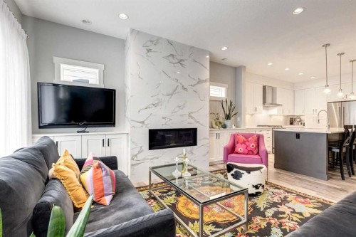 95 Sierra Morena Manor Sw, Calgary, AB - Indoor Photo Showing Living Room With Fireplace