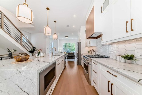 2426 53 Avenue Sw, Calgary, AB - Indoor Photo Showing Kitchen With Upgraded Kitchen