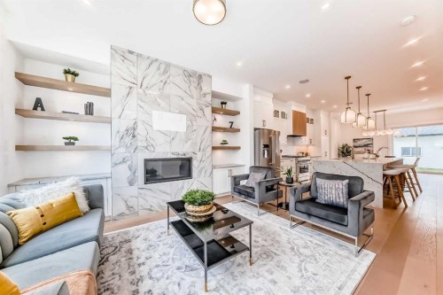 2426 53 Avenue Sw, Calgary, AB - Indoor Photo Showing Living Room With Fireplace