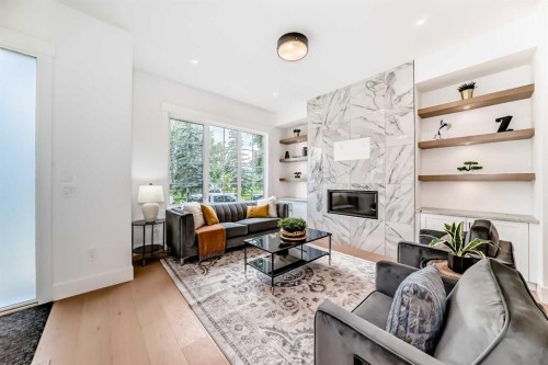 2426 53 Avenue Sw, Calgary, AB - Indoor Photo Showing Living Room With Fireplace
