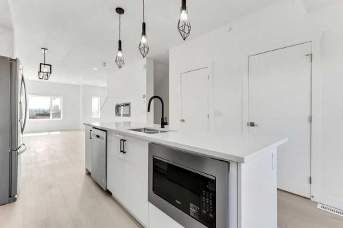 322 Sage Hill Circle Nw, Calgary, AB - Indoor Photo Showing Kitchen With Double Sink With Upgraded Kitchen