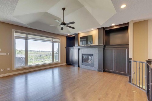 144 Tuscany Ravine Heights Nw, Calgary, AB - Indoor With Fireplace