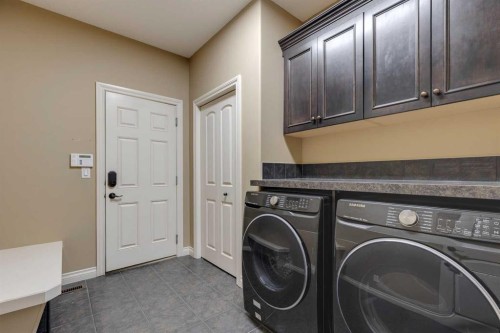 144 Tuscany Ravine Heights Nw, Calgary, AB - Indoor Photo Showing Laundry Room