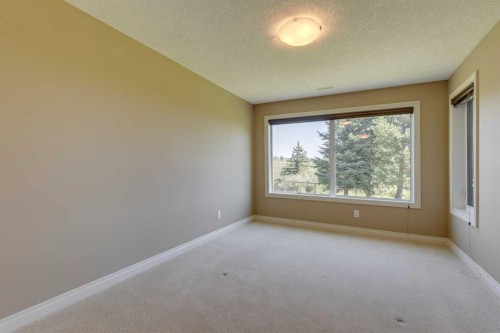 144 Tuscany Ravine Heights Nw, Calgary, AB - Indoor Photo Showing Other Room