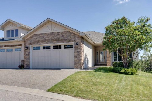 144 Tuscany Ravine Heights Nw, Calgary, AB - Outdoor With Facade