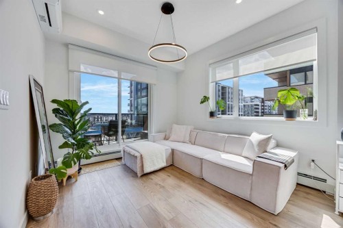 402-8230 Broadcast Avenue, Calgary, AB - Indoor Photo Showing Living Room