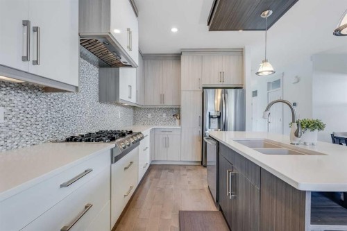 434 30 Avenue Nw, Calgary, AB - Indoor Photo Showing Kitchen With Double Sink With Upgraded Kitchen