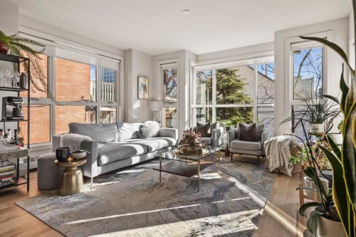 203-1730 5A Street Sw, Calgary, AB - Indoor Photo Showing Living Room