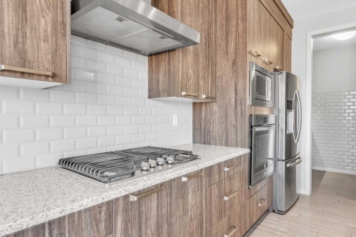 69 Howse Common Ne, Calgary, AB - Indoor Photo Showing Kitchen With Upgraded Kitchen