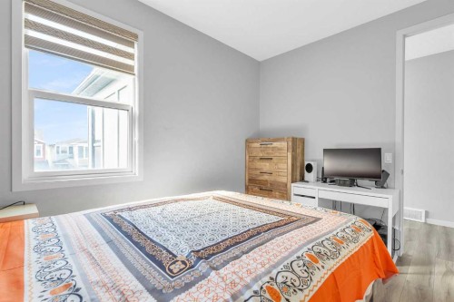 69 Howse Common Ne, Calgary, AB - Indoor Photo Showing Bedroom