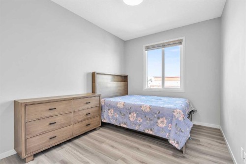 69 Howse Common Ne, Calgary, AB - Indoor Photo Showing Bedroom