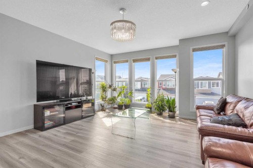 69 Howse Common Ne, Calgary, AB - Indoor Photo Showing Living Room
