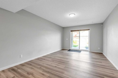 69 Howse Common Ne, Calgary, AB - Indoor Photo Showing Other Room