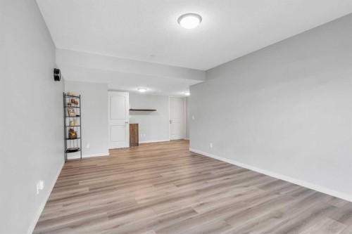 69 Howse Common Ne, Calgary, AB - Indoor Photo Showing Other Room