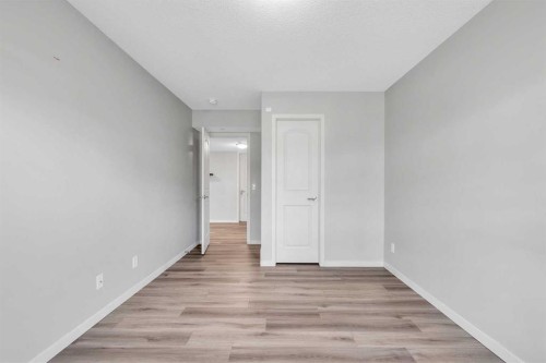 69 Howse Common Ne, Calgary, AB - Indoor Photo Showing Other Room