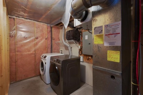 427 Saddlebrook Way Ne, Calgary, AB - Indoor Photo Showing Laundry Room