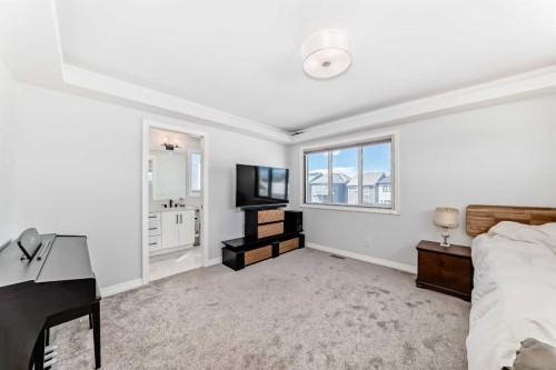 108 Magnolia Way Se, Calgary, AB - Indoor Photo Showing Bedroom