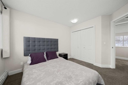 8-301 Village Mews Sw, Calgary, AB - Indoor Photo Showing Bedroom