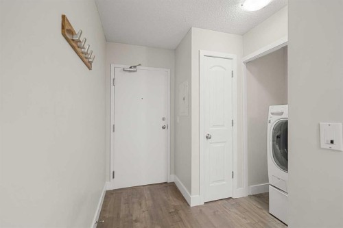 8-301 Village Mews Sw, Calgary, AB - Indoor Photo Showing Laundry Room