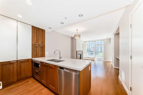 521-222 Riverfront Avenue Sw, Calgary, AB - Indoor Photo Showing Kitchen With Double Sink
