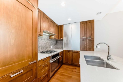 521-222 Riverfront Avenue Sw, Calgary, AB - Indoor Photo Showing Kitchen With Double Sink With Upgraded Kitchen