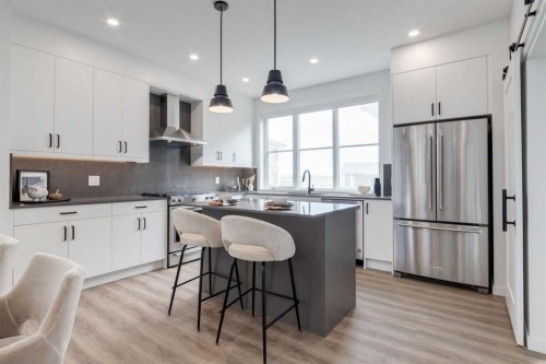 410-1453 Na'A Drive Sw, Calgary, AB - Indoor Photo Showing Kitchen With Upgraded Kitchen