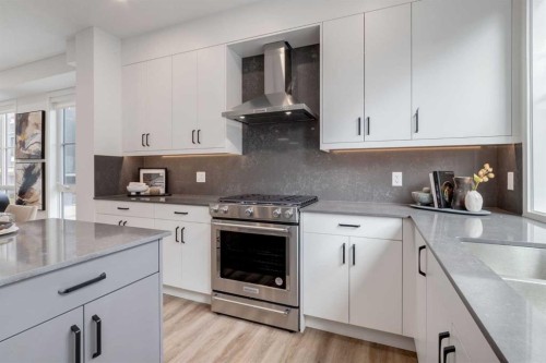 410-1453 Na'A Drive Sw, Calgary, AB - Indoor Photo Showing Kitchen