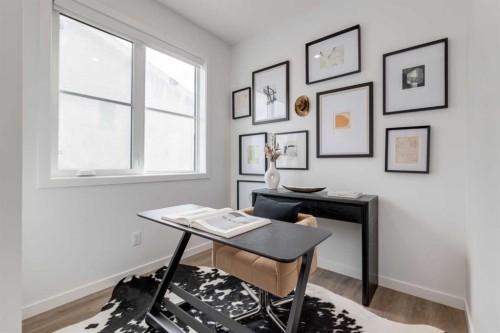 410-1453 Na'A Drive Sw, Calgary, AB - Indoor Photo Showing Other Room