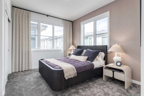 410-1453 Na'A Drive Sw, Calgary, AB - Indoor Photo Showing Bedroom