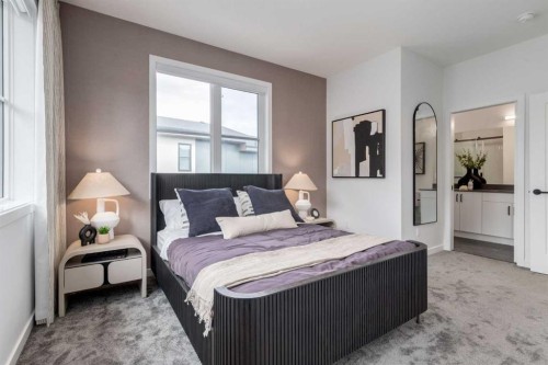 410-1453 Na'A Drive Sw, Calgary, AB - Indoor Photo Showing Bedroom