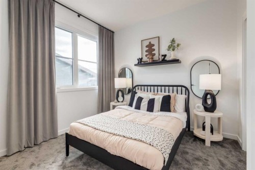 410-1453 Na'A Drive Sw, Calgary, AB - Indoor Photo Showing Bedroom