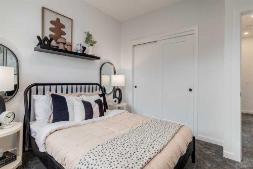 410-1453 Na'A Drive Sw, Calgary, AB - Indoor Photo Showing Bedroom