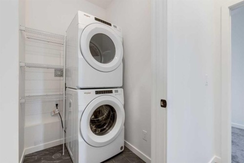 410-1453 Na'A Drive Sw, Calgary, AB - Indoor Photo Showing Laundry Room