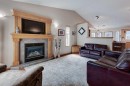 3 Strathmore Lakes Bay, Strathmore, AB  - Indoor Photo Showing Living Room With Fireplace 