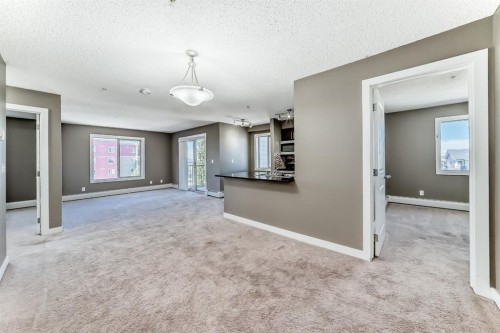 302-15 Saddlestone Way Ne, Calgary, AB - Indoor Photo Showing Other Room