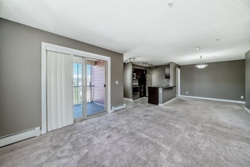 302-15 Saddlestone Way Ne, Calgary, AB - Indoor Photo Showing Other Room