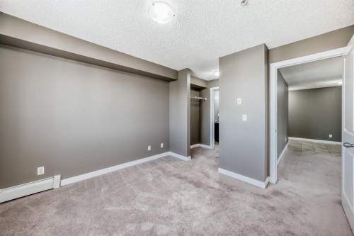 302-15 Saddlestone Way Ne, Calgary, AB - Indoor Photo Showing Other Room