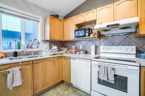 6216 Taralea Park Ne, Calgary, AB - Indoor Photo Showing Kitchen With Double Sink