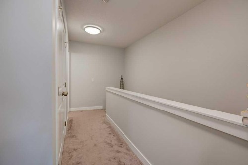 561 Canals Crossing Sw, Airdrie, AB - Indoor Photo Showing Other Room