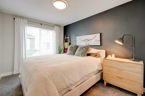 561 Canals Crossing Sw, Airdrie, AB - Indoor Photo Showing Bedroom