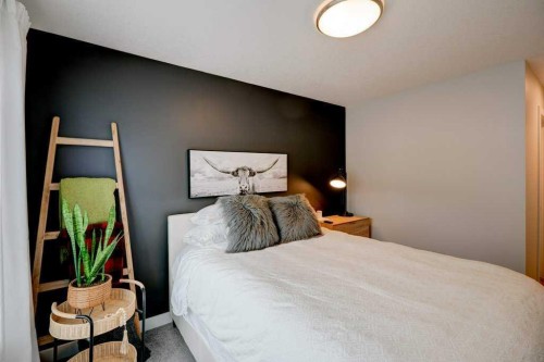 561 Canals Crossing Sw, Airdrie, AB - Indoor Photo Showing Bedroom