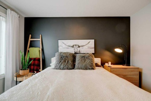 561 Canals Crossing Sw, Airdrie, AB - Indoor Photo Showing Bedroom
