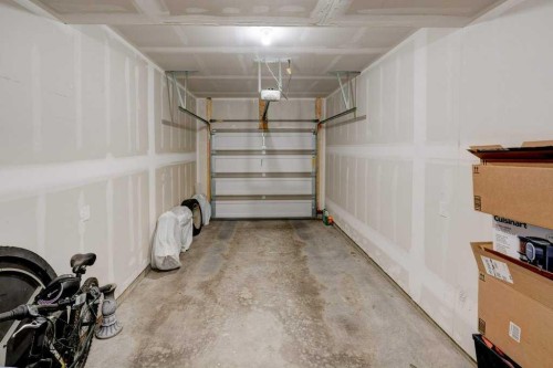 561 Canals Crossing Sw, Airdrie, AB - Indoor Photo Showing Garage
